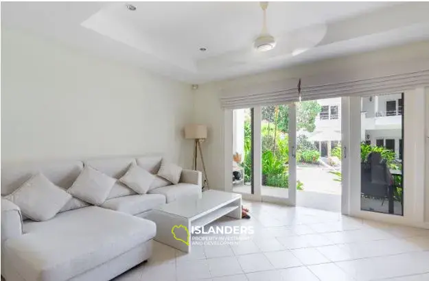 2-bdrm townhouse with shared pool in a well-maintained complex (Bangrak)