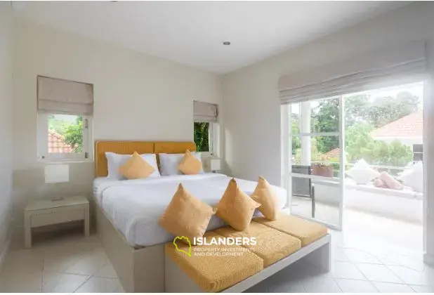 2-bdrm townhouse with shared pool in a well-maintained complex (Bangrak)