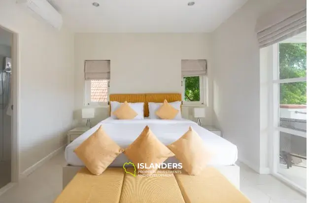 2-bdrm townhouse with shared pool in a well-maintained complex (Bangrak)
