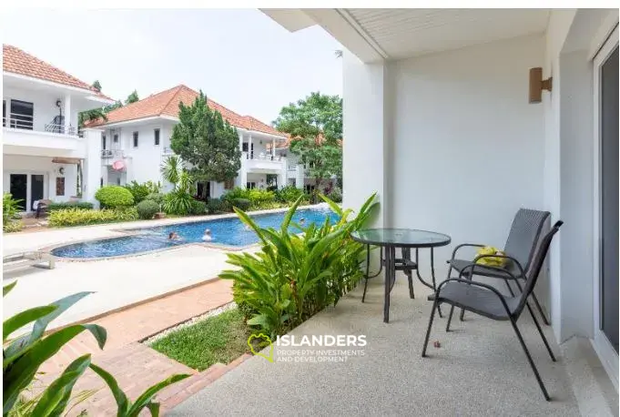 2-bdrm townhouse with shared pool in a well-maintained complex (Bangrak)