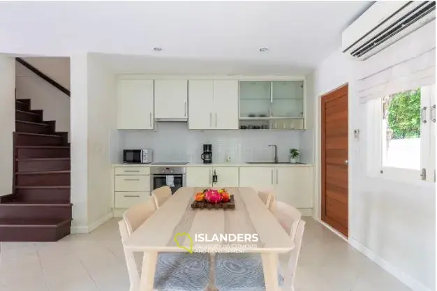 2-bdrm townhouse with shared pool in a well-maintained complex (Bangrak)