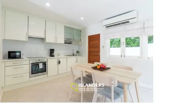 2-bdrm townhouse with shared pool in a well-maintained complex (Bangrak)