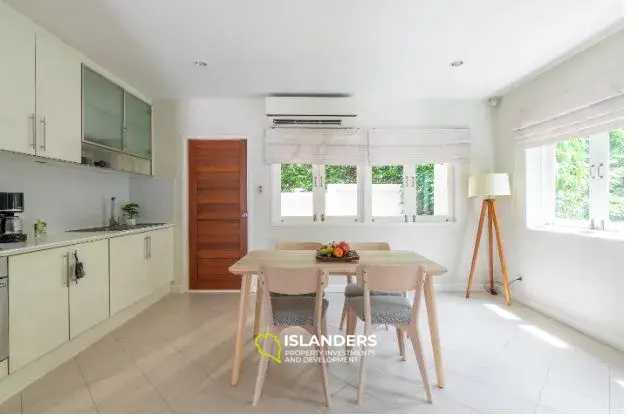 2-bdrm townhouse with shared pool in a well-maintained complex (Bangrak)