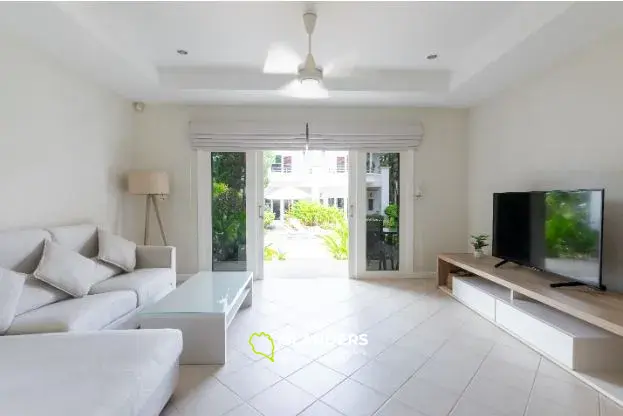 2-bdrm townhouse with shared pool in a well-maintained complex (Bangrak)