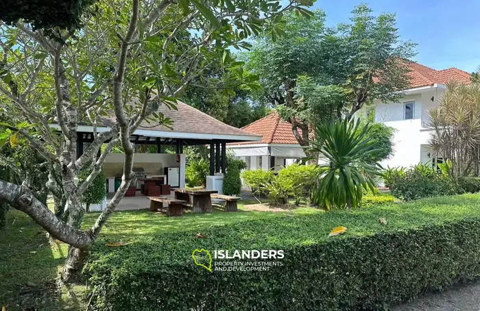 2-bdrm townhouse with shared pool in a well-maintained complex (Bangrak)