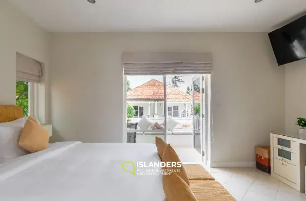 2-bdrm townhouse with shared pool in a well-maintained complex (Bangrak)
