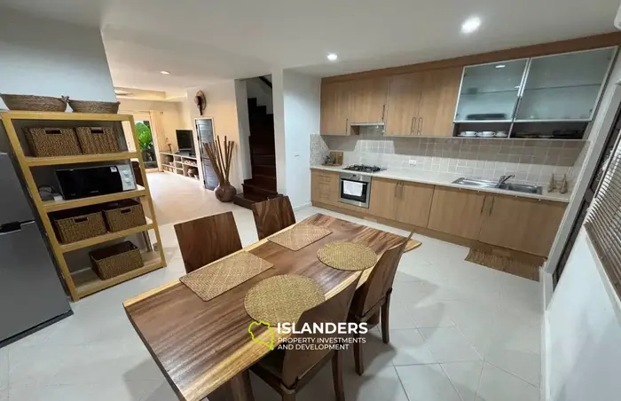 2-bdrm townhouse with shared pool in a well-maintained complex (Bangrak)