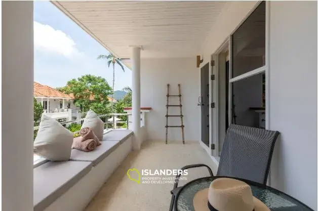 2-bdrm townhouse with shared pool in a well-maintained complex (Bangrak)