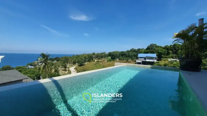 Poolvilla mit Meerblick – fußläufig zum Strand