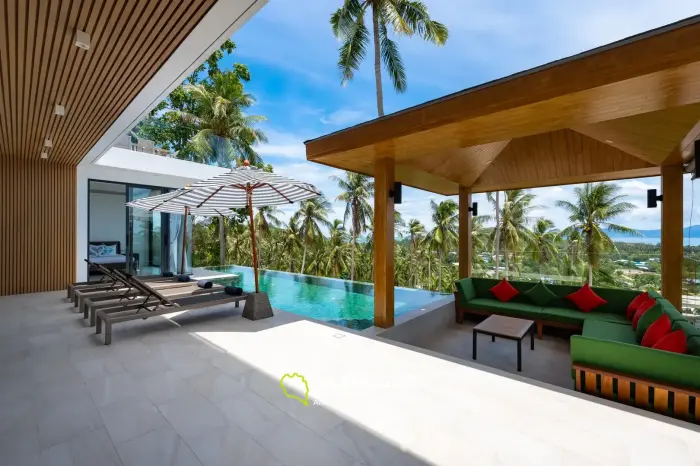 Villa de style avec 3 chambres et piscine surplombant la mer et l'île voisine.