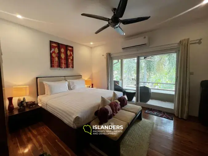 Двухэтажный таунхаус с 2 спальнями в комплексе с тропическими садами и общим бассейном (Банграк)