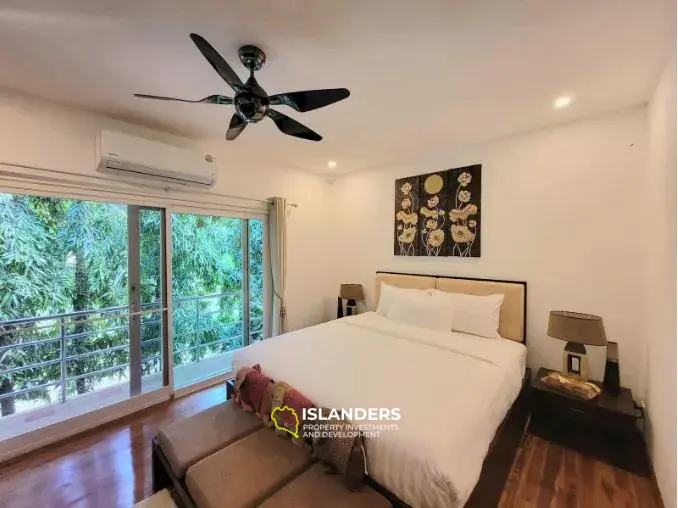 Двухэтажный таунхаус с 2 спальнями в комплексе с тропическими садами и общим бассейном (Банграк)