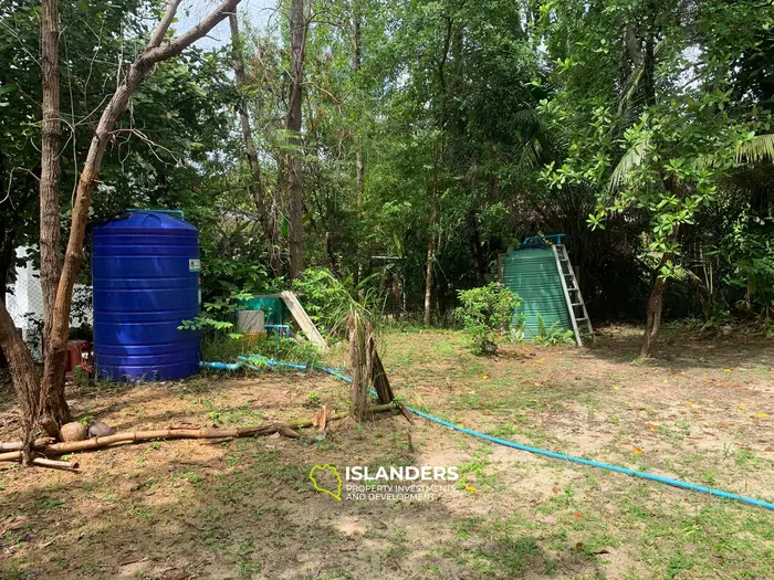 Плоская земля с 2 домами на Кокосовой аллее!