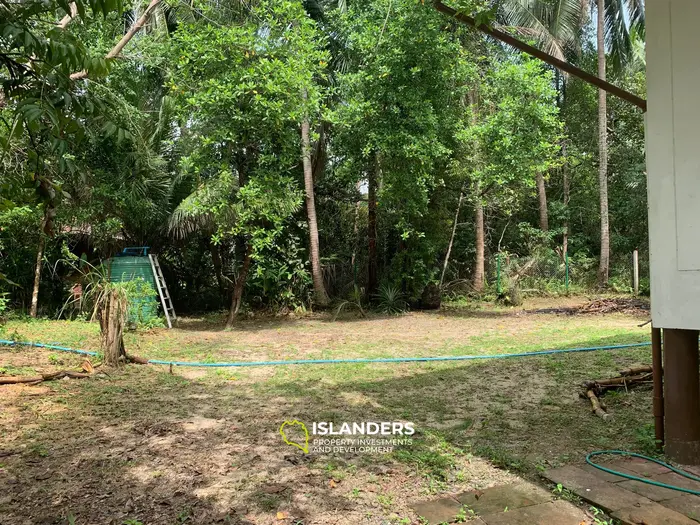 Плоская земля с 2 домами на Кокосовой аллее!