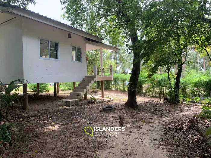 Плоская земля с 2 домами на Кокосовой аллее!